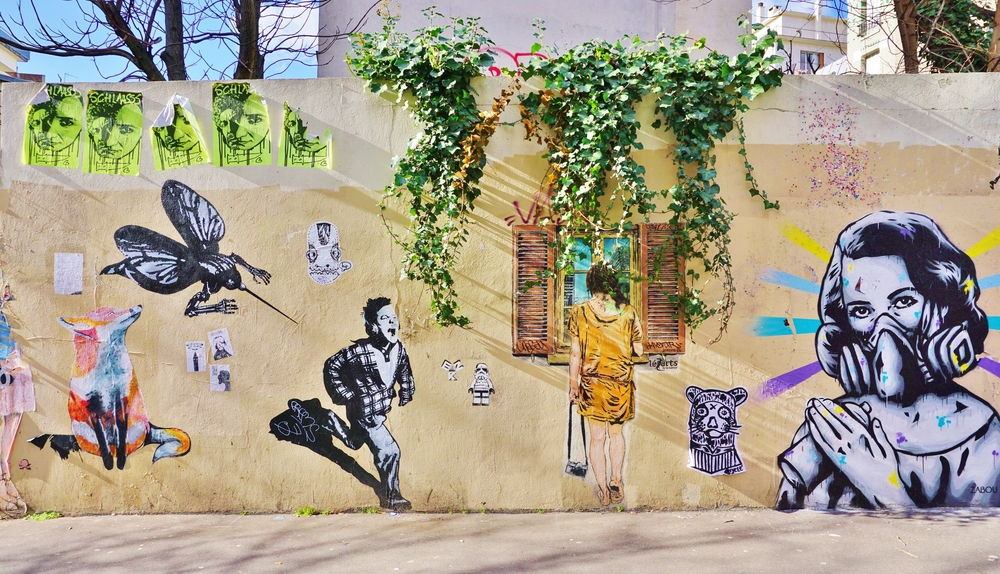 Mural on a wall in Paris, France - street art in Paris